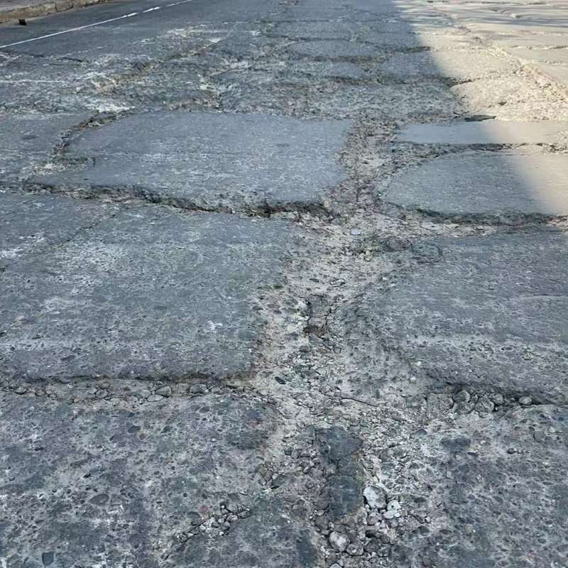 雨湖路面起砂露石子修补料